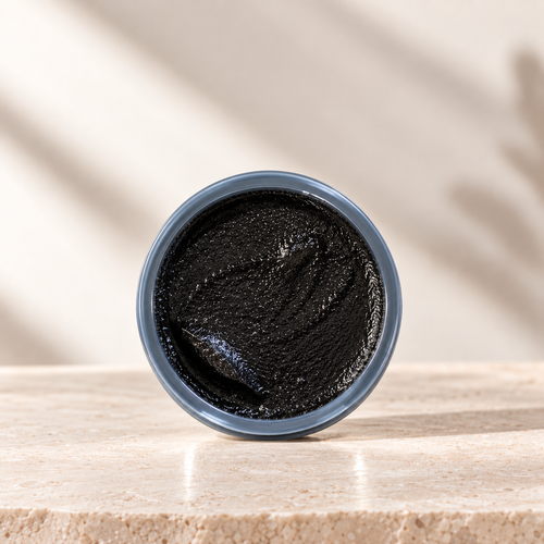 Charcoal Body Scrub jar with activated charcoal for brighter skin